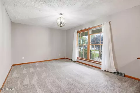 Living - 313 E 7th St, Sycamore, OH 44882 photo 5 of 17