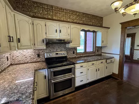 Kitchen - 306 E Church St, West Unity, OH 43570 photo 3 of 5