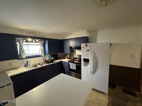 Kitchen - 107 W North St, West Unity, OH 43570 photo 3 of 3