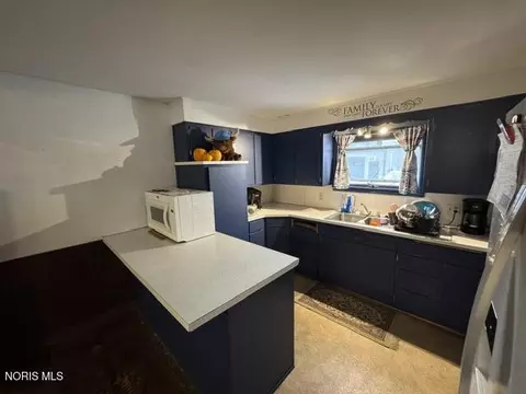 Kitchen - 107 W North St, West Unity, OH 43570 photo 2 of 3