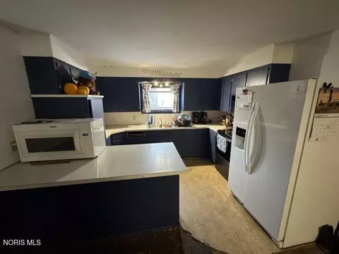 Kitchen - 107 W North St, West Unity, OH 43570 photo 1 of 3