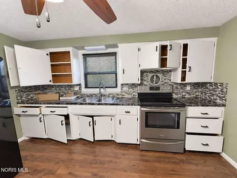 Kitchen - 211 N Walnut St, Paulding, OH 45879 photo 2 of 3
