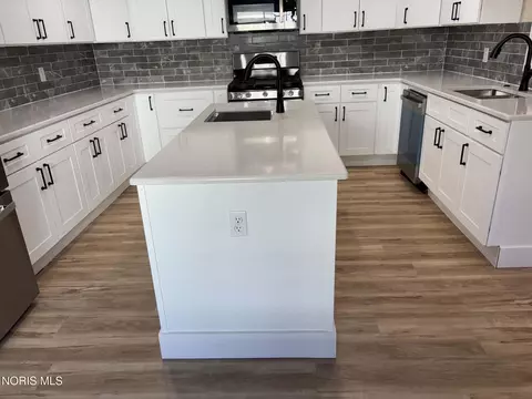 Kitchen - 124 E Maple St, Deshler, OH 43516 photo 2 of 2