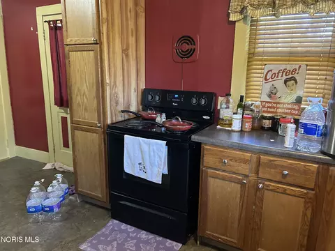 Kitchen - 203 Brush St, Pioneer, OH 43554 photo 2 of 2