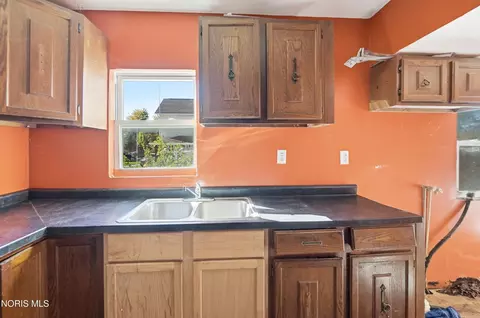Kitchen - 217 E Walnut St, Wauseon, OH 43567 photo 2 of 3