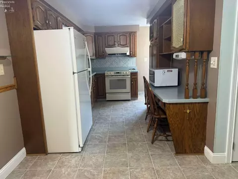 Kitchen - 320 W Strub Rd, Sandusky, OH 44870 photo 1 of 4