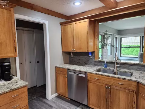 Kitchen - 712 Gloucester Dr, Huron, OH 44839 photo 3 of 10