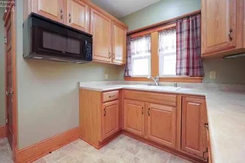 Kitchen - 311 White St, Clyde, OH 43410 photo 1 of 2