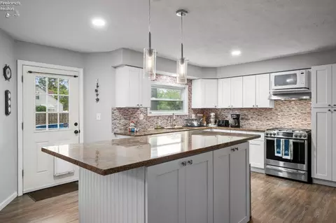 Kitchen - 411 N Abbe Rd, Elyria, OH 44035 photo 2 of 4