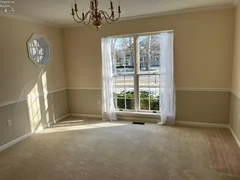 Living - 838 Gloucester Dr, Huron, OH 44839 photo 1 of 4