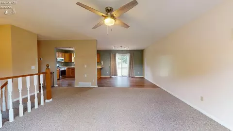 Living - 1005 Tamarack Dr, Willard, OH 44890 photo 6 of 7