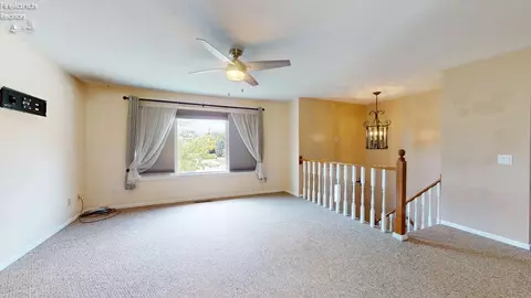 Living - 1005 Tamarack Dr, Willard, OH 44890 photo 4 of 7