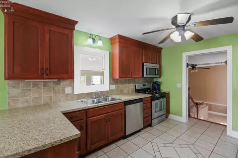 Kitchen - 145 White St, Clyde, OH 43410 photo 3 of 4