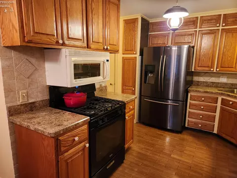 Kitchen - 542 Berlin Rd, Huron, OH 44839 photo 2 of 12