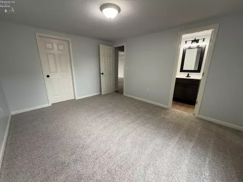 Bedroom - 33 E League St, Norwalk, OH 44857 photo 2 of 5