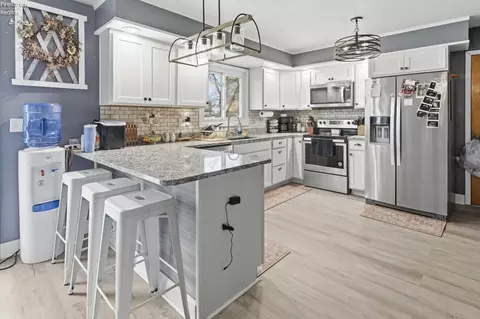 Kitchen - 557 E Maple St, Clyde, OH 43410 photo 2 of 4