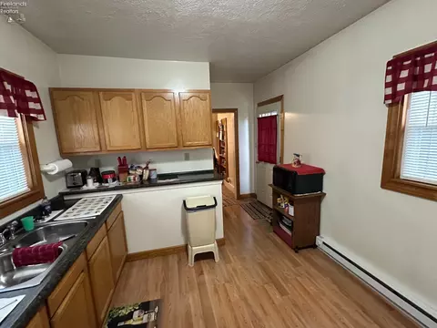 Kitchen - 410 Emerald St, Willard, OH 44890 photo 2 of 4