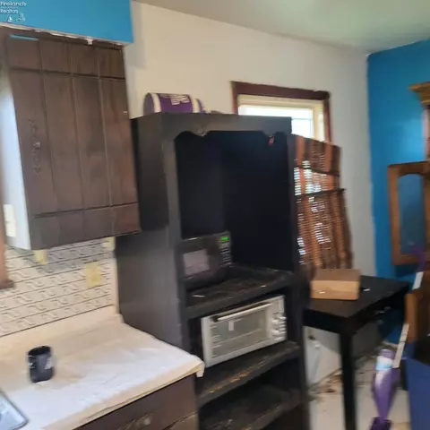 Kitchen - 1639 S St Rt 99, Willard, OH 44890 photo 2 of 2