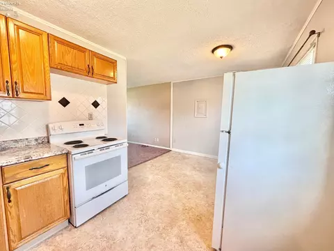 Kitchen - 420 Moore Ave, Bellevue, OH 44811 photo 3 of 4