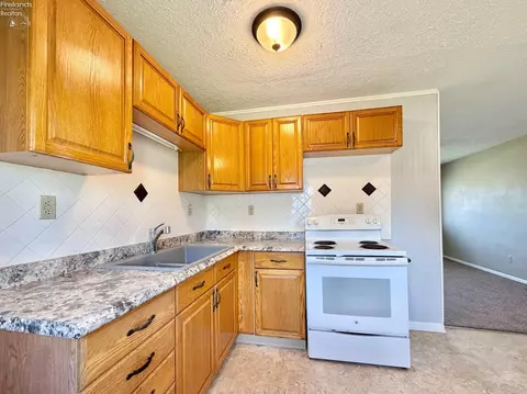 Kitchen - 420 Moore Ave, Bellevue, OH 44811 photo 2 of 4