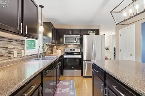 Kitchen - 702 Heron Dr, Huron, OH 44839 photo 4 of 5