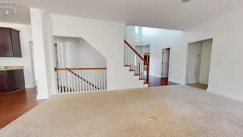 Living - 1140 Meadowview Dr, Willard, OH 44890 photo 2 of 4