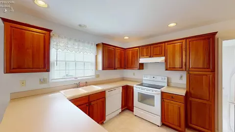 Kitchen - 1909 E Waterberry Dr, Huron, OH 44839 photo 2 of 2