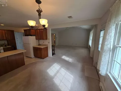 Living - 1909 E Waterberry Dr, Huron, OH 44839 photo 1 of 8