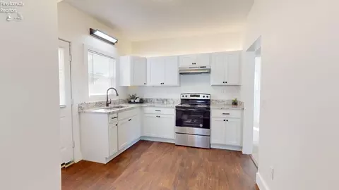 Kitchen - 110 Emerald St, Willard, OH 44890 photo 2 of 2