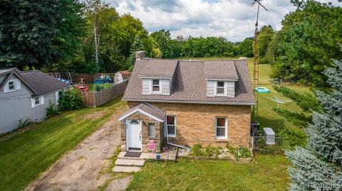 435 Lamb St, Perry, MI 48872 photo 1