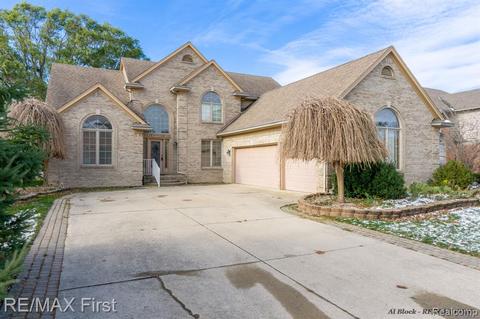 45143 Riverwoods Dr, Macomb, MI 48044 photo 1