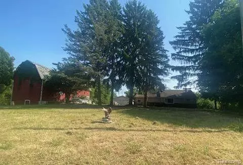 6687 Grand River Rd, Handy, MI 48836