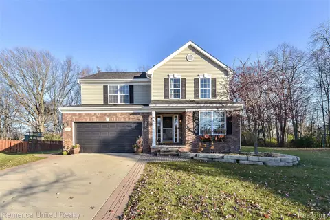 1668 Four Seasons Dr, Howell, MI 48843