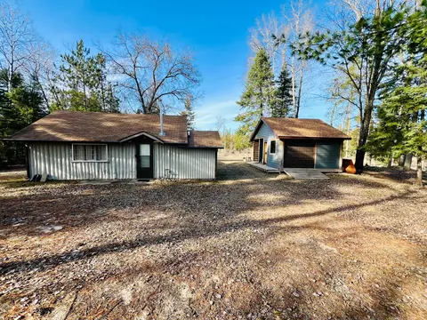761 E Houghton Creek Rd, Cumming, MI 48654