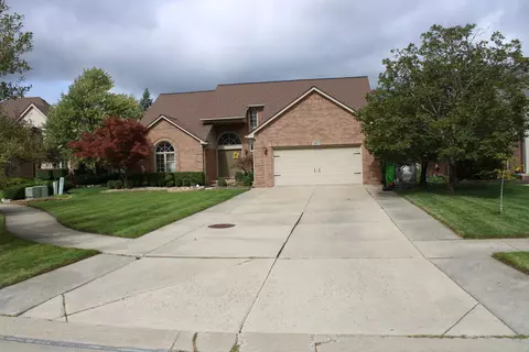 15877 Tea Rose Dr, Macomb, MI 48042