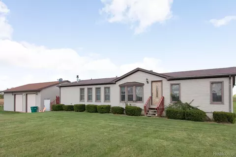 8610 Lohr Rd, Greenwood, MI 48006