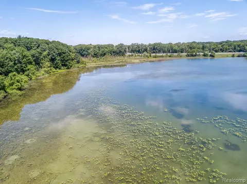 11306 Woodruff Lk, Brighton, MI 48116 | 32 Photos - Movoto