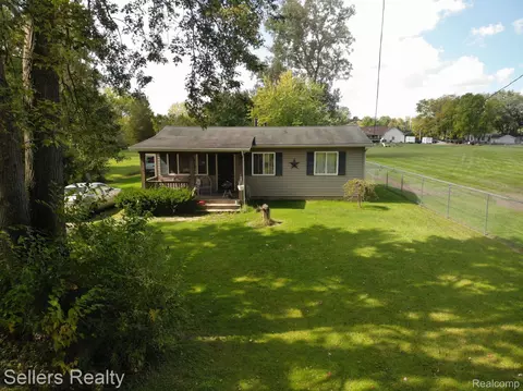 1448 Calvin Dr, Burton, MI 48509