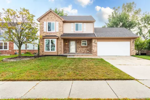 2465 Woodmont Dr E, Canton, MI 48188