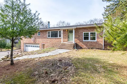 8099 Huron River Dr, Webster, MI 48130