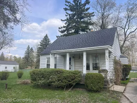 1483 S Belsay Rd, Burton, MI 48509