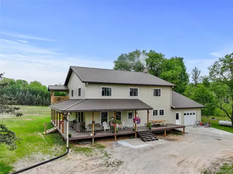 8875 N Lakola Rd, Dover, MI 49688