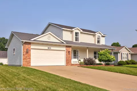 3239 Centennial Oak Ct, Vienna, MI 48420