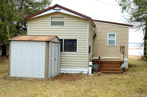 27021 S First Point Landing Rd, Raber, MI 49736