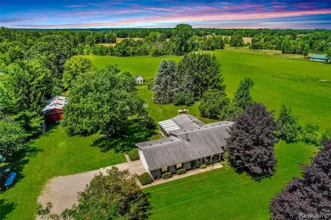 595 N Cedar Rd, Handy, MI 48836