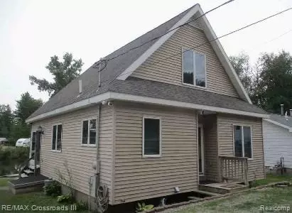 7527 Cove Rd, Plainfield, MI 48739