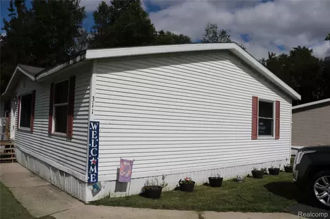 311 Peach Blossom Ct, Otisville, MI 48463