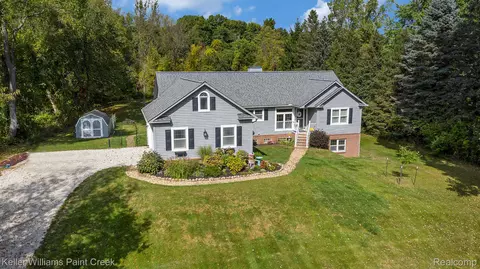 665 Rolling Acres Dr, Brandon, MI 48462