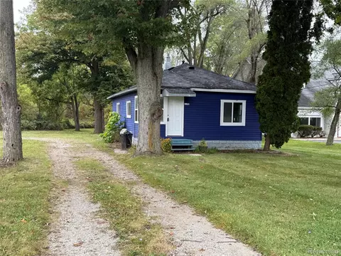1220 S Belsay Rd, Burton, MI 48509
