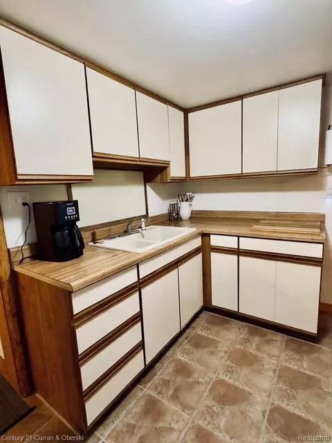 Kitchen - 111 Petoskey Dr, Roscommon, MI 48653 photo 3 of 3